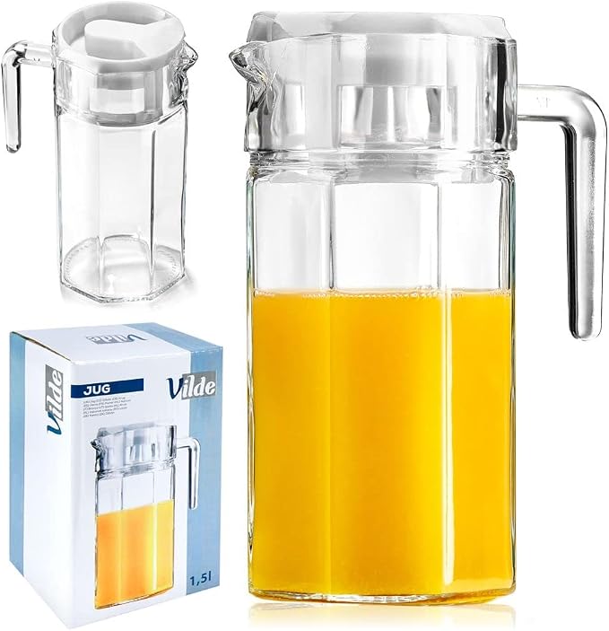 Jarra VILDE de vidrio transparente de 1,5 litros con asa, pico y tapa clara, mostrada con zumo