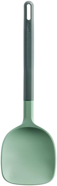 Volteador Lékué de silicona verde con pala lisa y profunda para wok