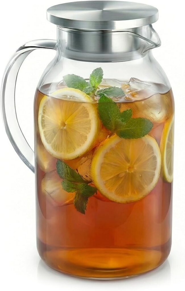 Jarra Arendo grande de vidrio de borosilicato con asa, tapa metálica y agua con limón y hierbabuena